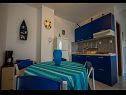 Apartmány Daju - 3 colours: A1 plavi(2+2), A2 žuti(4+1), A3 narančasti(2) Ždrelac - Ostrov Pašman  - Apartmán - A1 plavi(2+2): kuhyňa a jedáleň