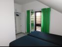 Apartmány Coloured - apartments on island: A1 - plavi (4):, A2 -zeleni (4):, SA3 - studio (2+1):, A4 - bijeli (4+2): Povlja - Ostrov Brač  - Apartmán - A4 - bijeli (4+2):: spálňa